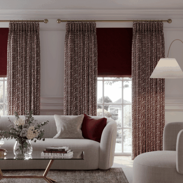 red/golden living room with Vine Merlot curtains and ortega cranberry roman blinds